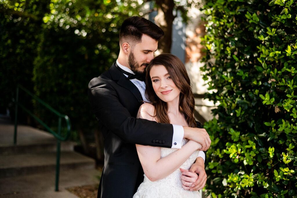 Bride and groom hugging